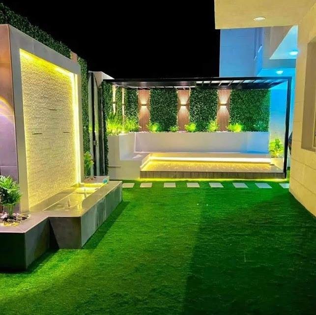 عشب صناعي في تنسيق حدائق حي الياسمين بالرياض